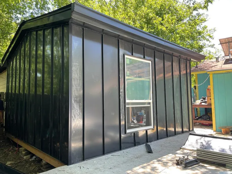 Black standing seam metal wall panels for Metal Roof Installation in Royalton