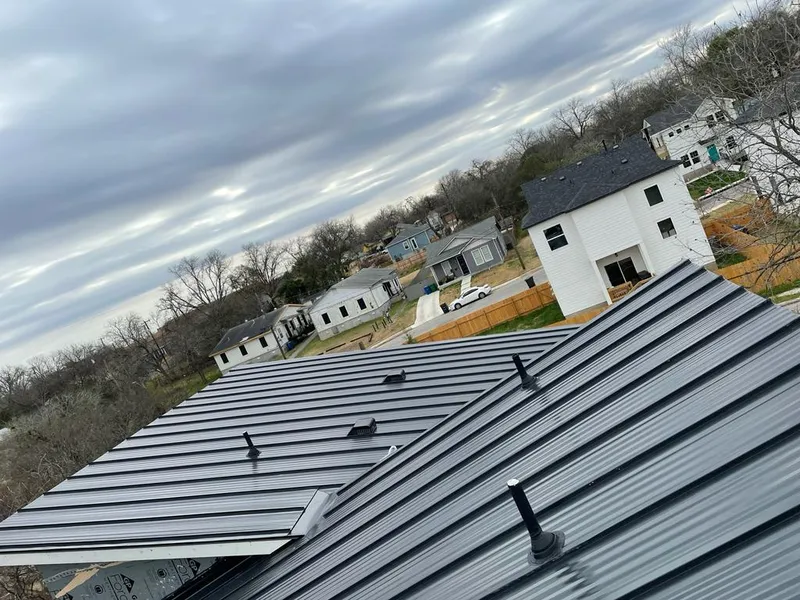 Standing seam metal roof panels with vents for Skylight Repair in Royalton